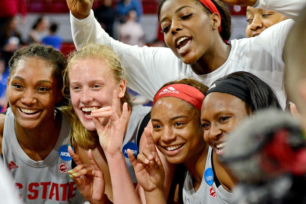 Senior forward DD Rogers, freshman center Elissa Cunane, sophomore guard Kai Crutchfield, freshman forward Jada Rice and graduate guard Kaila Ealey celebrate their win against Kentucky on Monday, March 25, 2019 at Reynolds Coliseum. The Wolfpack won 72-57.