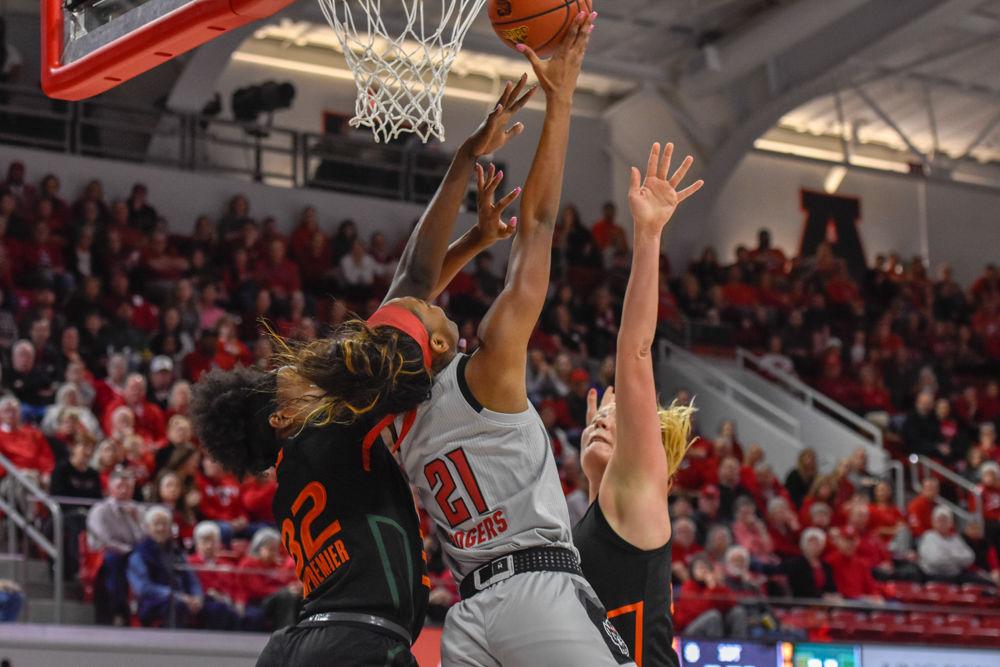 Senior DD Rogers jumps past the Miami Hurricanes defense and scores 21 points. The Wolfpack won 70-68 in Reynold's Coliseum on Sunday, March 3.