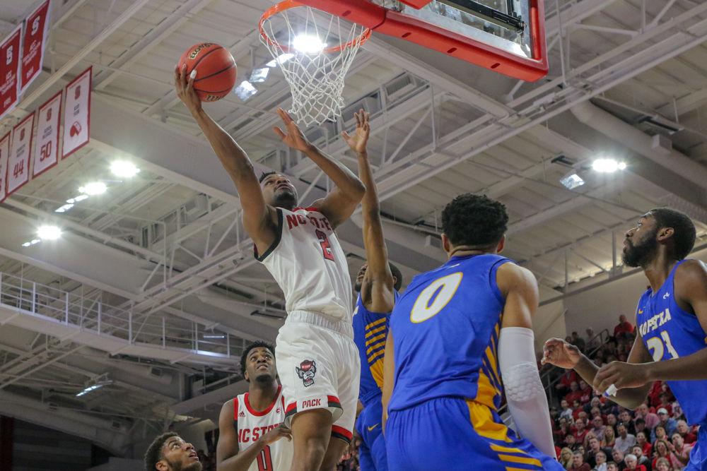 Redshirt senior guard Torin Dorn goes up for a layup. Dorn was a major player with 19 points and nine rebounds in his 31 minutes of play. The Wolfpack had an intense back and forth battle but were able to outlast Hofstra for an 84-78 win on Tuesday, March 19 in Reynolds Coliseum.