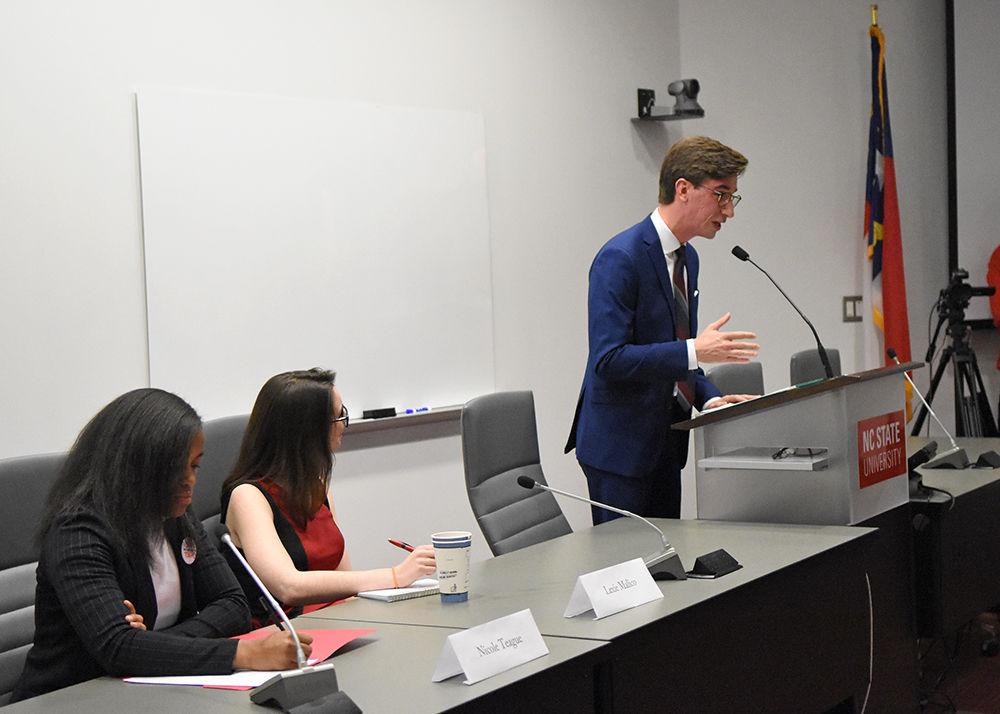 Technician editor-in-chief Jonathan Carter, a fourth-year studying political science, moderates at the student government election debate in the Senate Chambers in Talley Student Union on Thursday, Feb. 28.