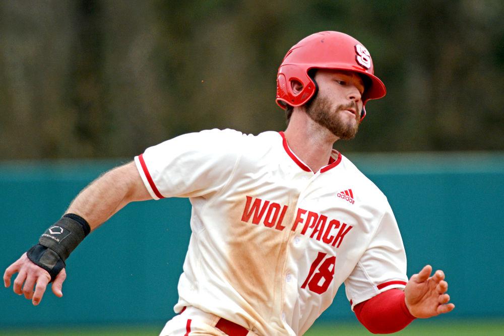 Senior infielder Evan Edwards rounds third base on Sunday, March 3, 2019 at Doak Field. Edwards went 4-5 with two doubles, two runs scored and one RBI in the Wolfpack's 5-4 walk-off win over Minnesota.