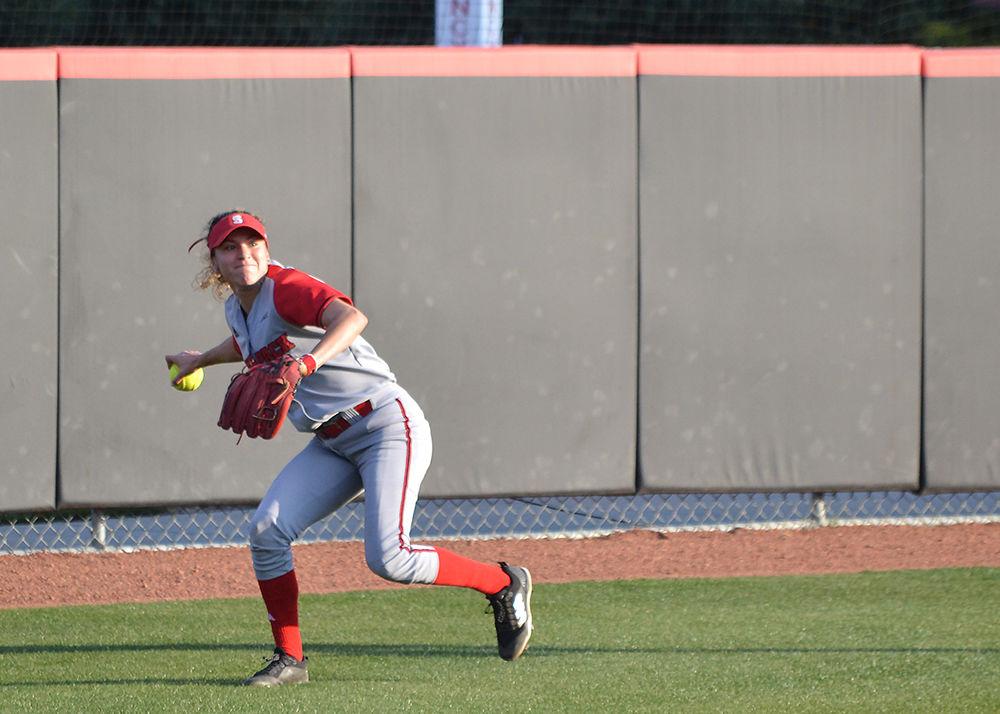 Sophomore outfielder Angie Rizzi throws back a fly ball during the game against Campbell University on April 11, 2018 in Dail Softball Stadium. The Wolfpack beat the Fighting Camels 6-5