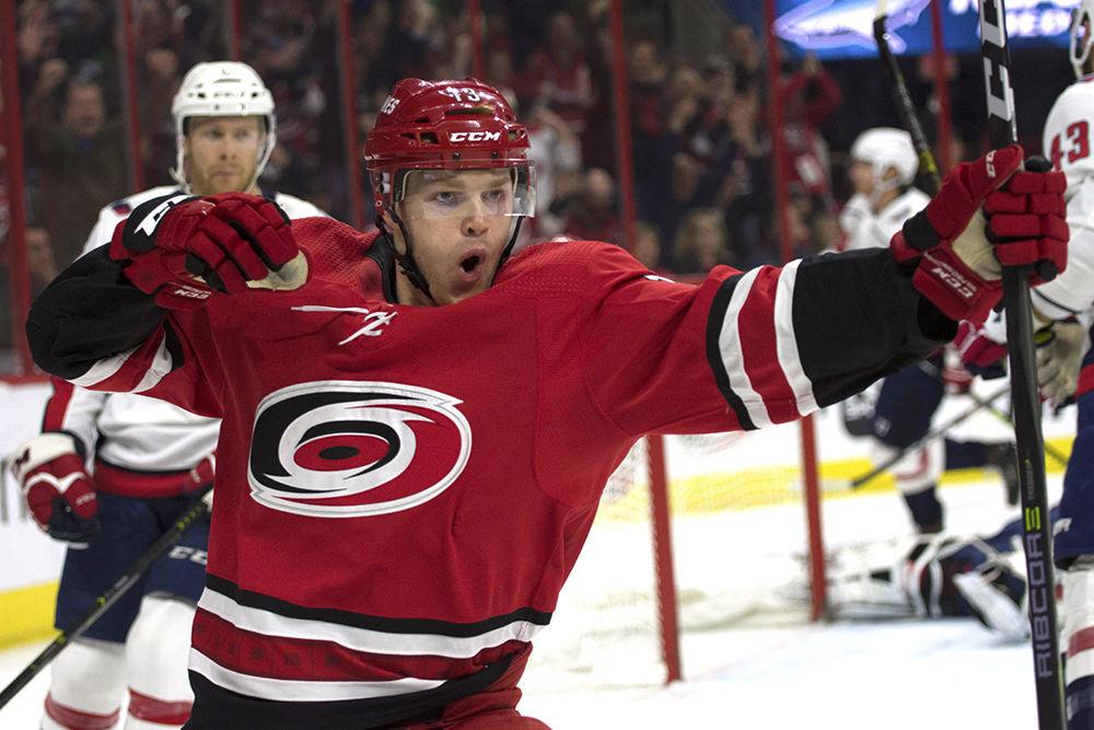 Left winger Warren Foegele bails to celebrate after scoring on Washington Capitals goaltender Braden Holtby during the second period in PNC Arena, Thursday, March 28. Despite an equally matched hustle throughout regulation, the Canes fell to the Caps, 3-2.&#160;