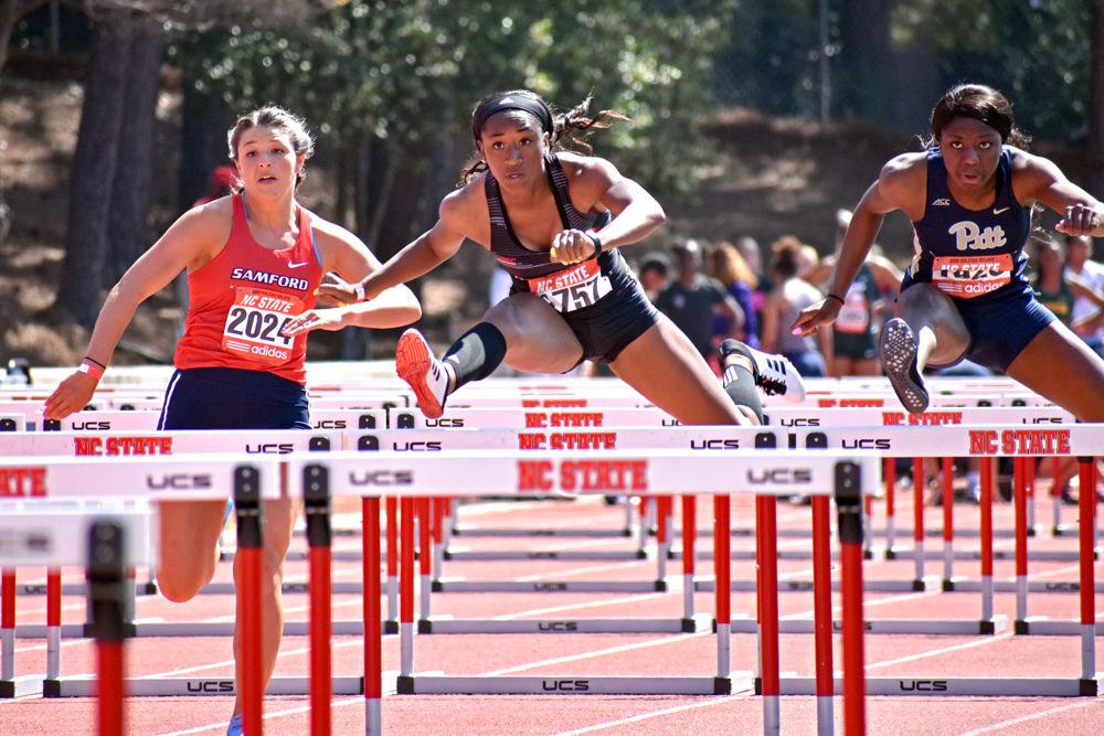 Sophomore Alexis Postell leaps over hurdles at the Raleigh Relays on Friday, March 29, 2019 at Paul Derr Track &amp; Field Facility. Postell finished sixth overall in the event.