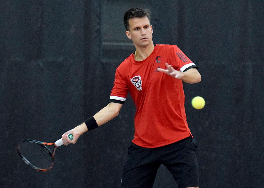 Senior Georgiy Malyshev prepares to send the ball to the other side of the court on Feb. 24, in the J.W. Isenhour Tennis Center.&#160; The Wolfpack beat the Virginia Tech Hokies 4-1 to advance to 8-3 on the season.