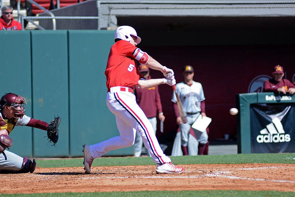 Sophomore catcher Patrick Bailey takes a swing during the first game of the doubleheader against Minnesota on Saturday, March 2, 2019 in Doak Field. The Wolfpack beat the Gophers 3-2, with Bailey going 0-2.