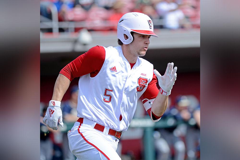 Sophomore catcher Patrick Bailey sprints after hitting the ball against Pittsburgh on Sunday, March 10, 2019 at Doak Field. Bailey went 2-4 with two doubles, one run scored and one strikeout in the Wolfpack's 6-5 win.
