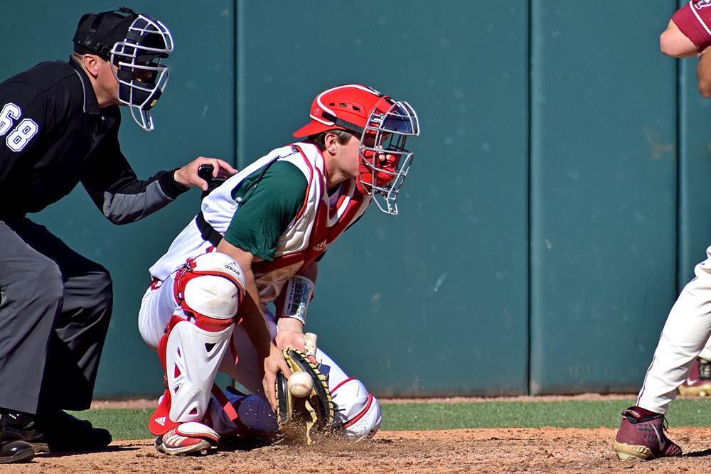 Sophomore catcher Patrick Bailey catches a pitch against Florida State on Sunday, March 17 in Doak Field. The Wolfpack lost 7-5 to the Seminoles as Bailey had one hit, one walk and one strikeout.