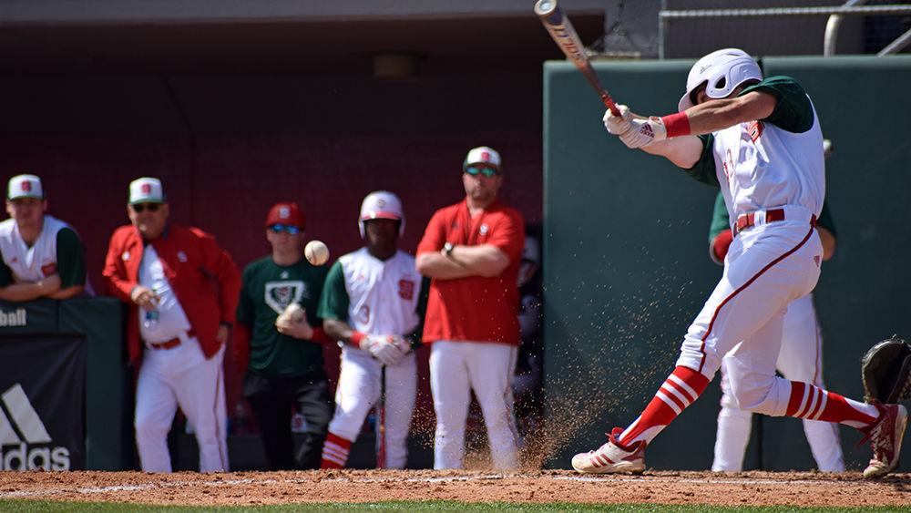 Freshman infield Tyler McDonough takes a swing against Florida State on Sunday, March 17, in Doak Field. The Wolfpack lost 5-7 to the Seminoles, with&#160;McDonough having 1 strikeout.