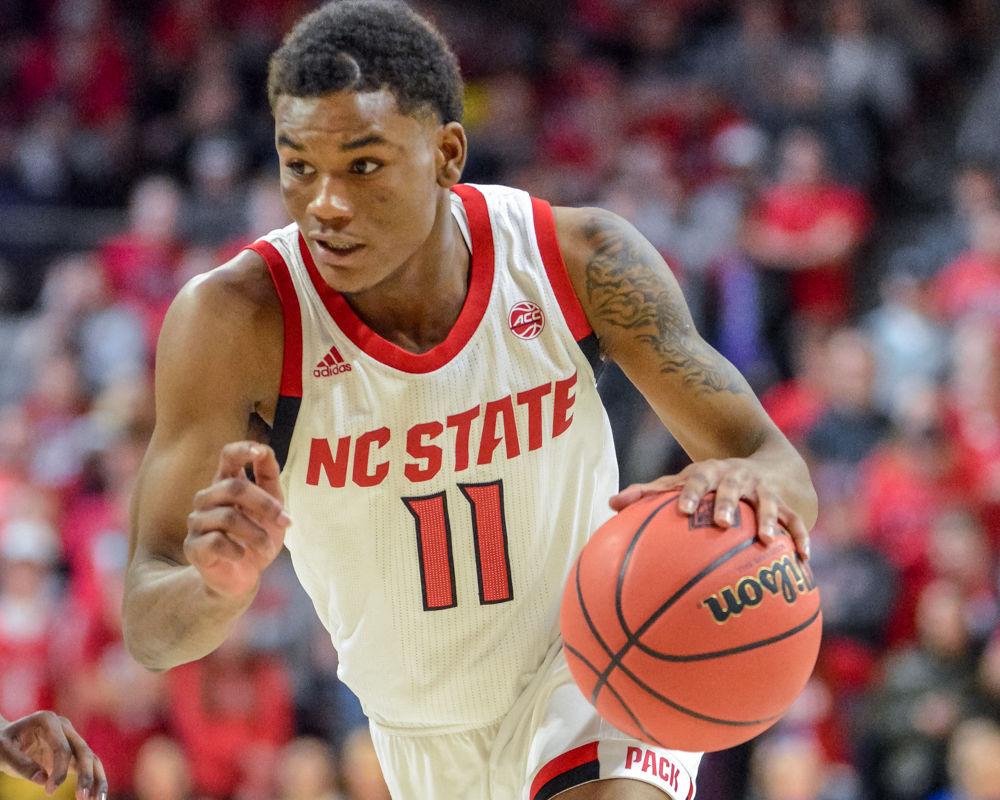 Junior guard Markell Johnson makes a fast break to the net during the NIT in Reynolds Coliseum on Tuesday, March 19. Johnson shot 9-16 from the field and contributed a team-high 26 points to the 84-78 win over Hofstra.