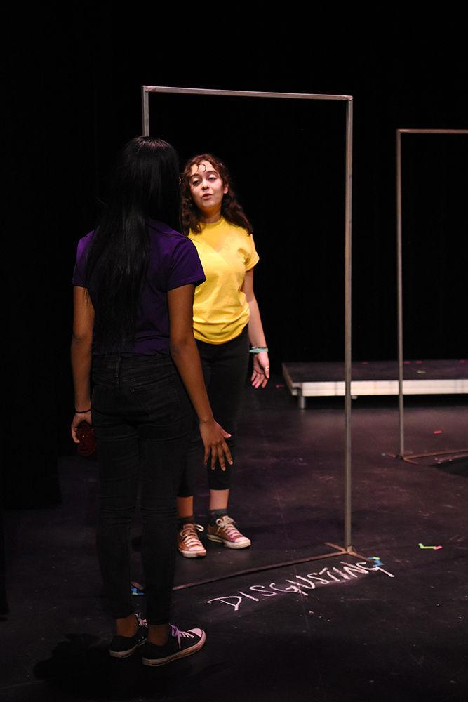 Michelle, played by Dani Coan, an engineering first year student, faces her inner version of Maliah, played by Malley Nelson, a first-year studying elementary education, during a dress rehearsal for A Good Little Rain on Monday, March 18, in Thompson Hall. The show will run March 20-24 in Kennedy-McIlwee Studio Theatre in Thompson Hall.