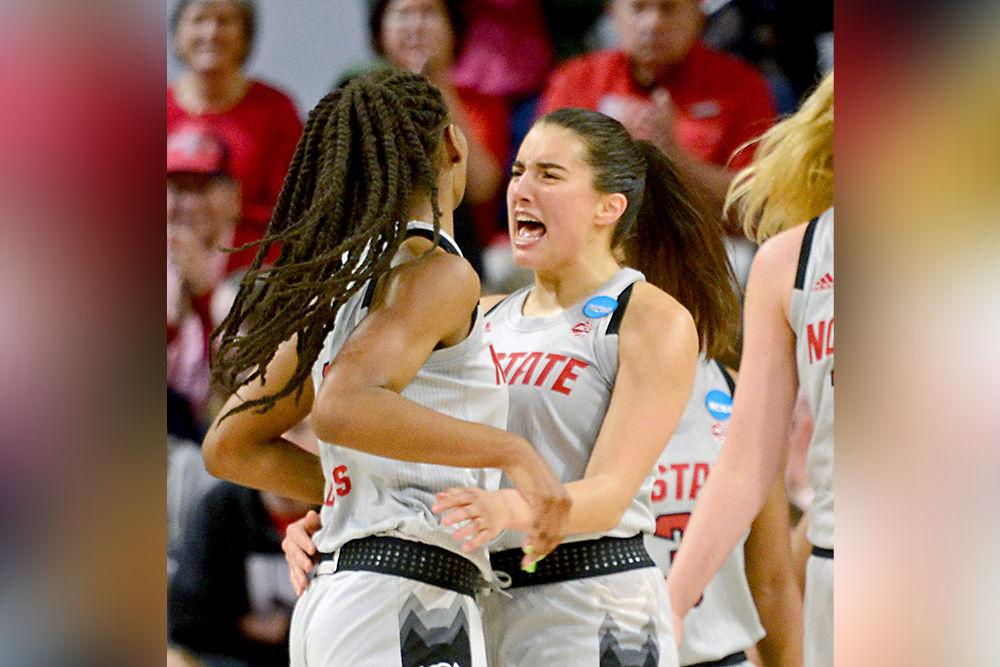 Junior guard Aislinn Konig and senior forward DD Rogers celebrate Rogers' and-one against Kentucky on Monday, March 25, 2019 at Reynolds Coliseum. The Wolfpack won 72-57.