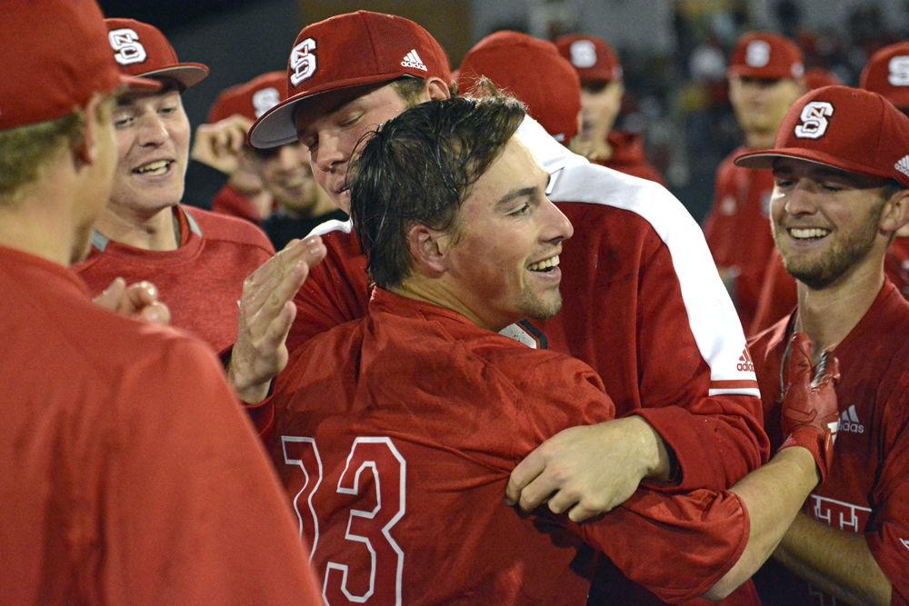 Freshman infielder Tyler McDonough celebrates his walk-off base hit against Florida State on Saturday, March 16, 2019 at Doak Field. McDonough went 3-4 with one double, two runs batted in, two runs scored and one walk in the Wolfpack&#8217;s 9-8 win over the Seminoles.