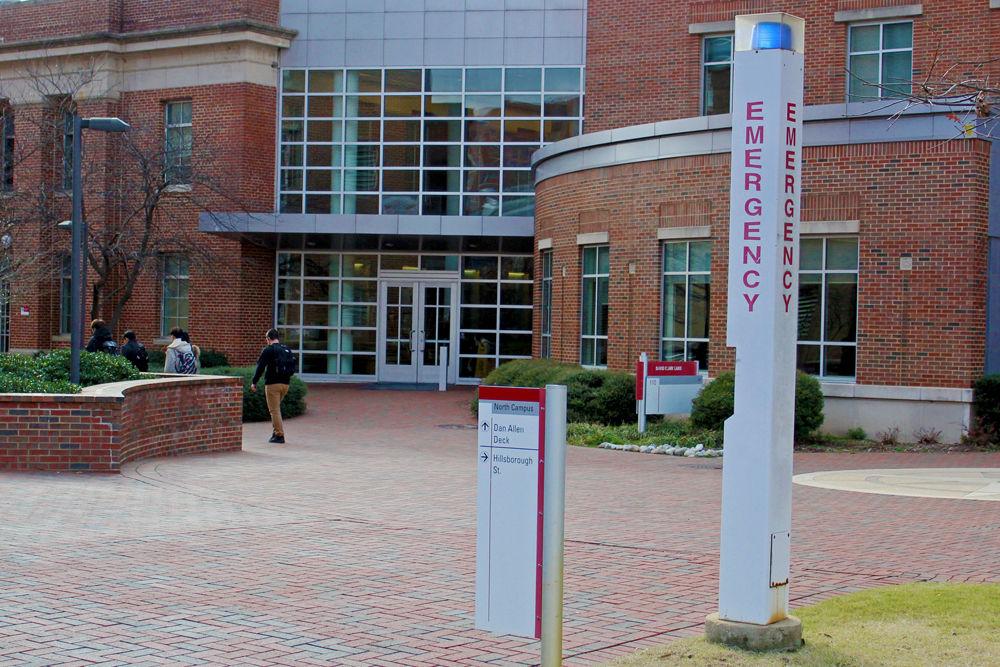 An emergency blue light stands near the Fox Science Teaching Laboratory and David Clark Labs. Blue lights serve as an aid to those who need help in times of emergency. The station quickly allows students to contact NC State University Police Department.