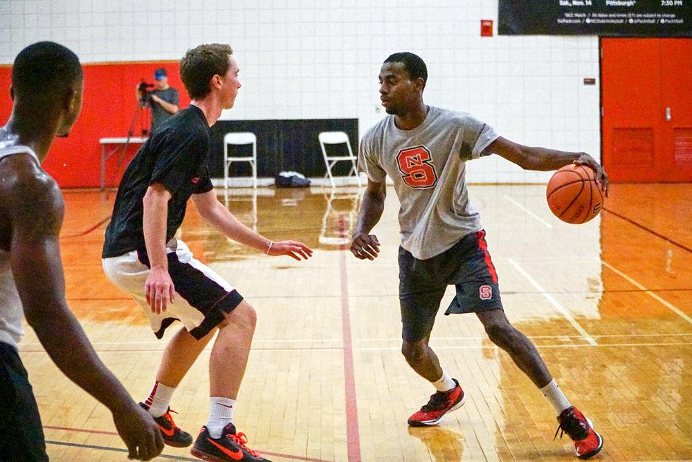 Quante Lee, a third-year in chemical engineering, makes a move at a club basketball scrimmage which was held in Carmichael Gym on Wednesday, Sept. 14, 2015.