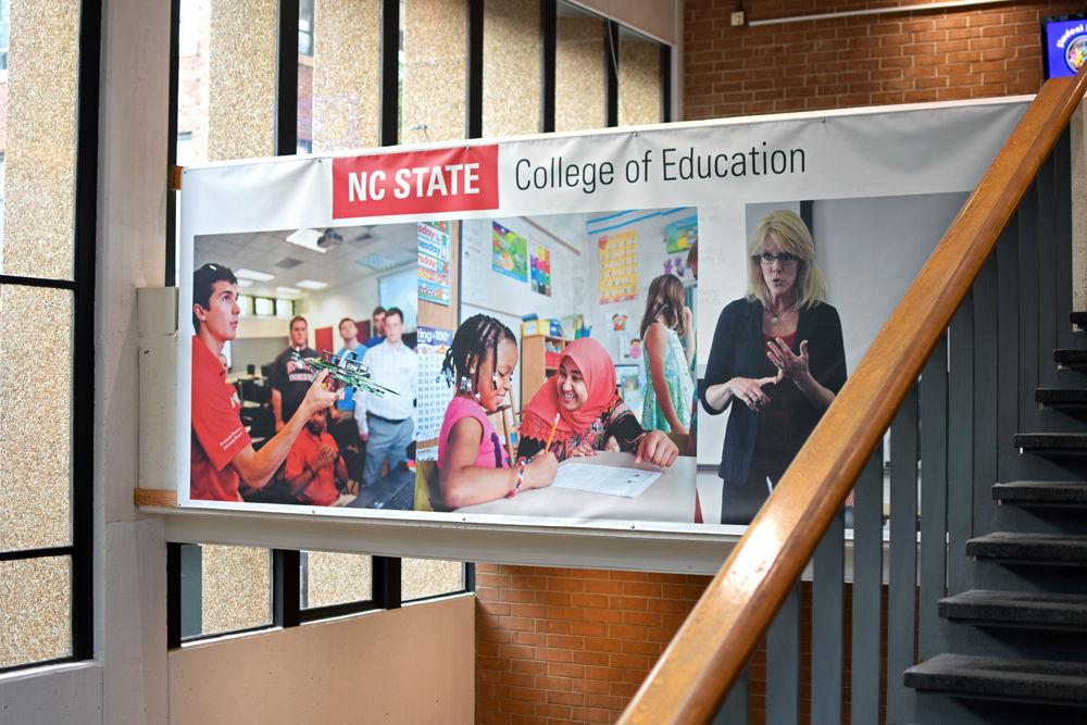 A banner advertising the NC State College of Education hangs in the entrance to Poe Hall on Aug. 30, 2017. Poe Hall is home to the education school at NC State as well as the psychology department and STEM education.