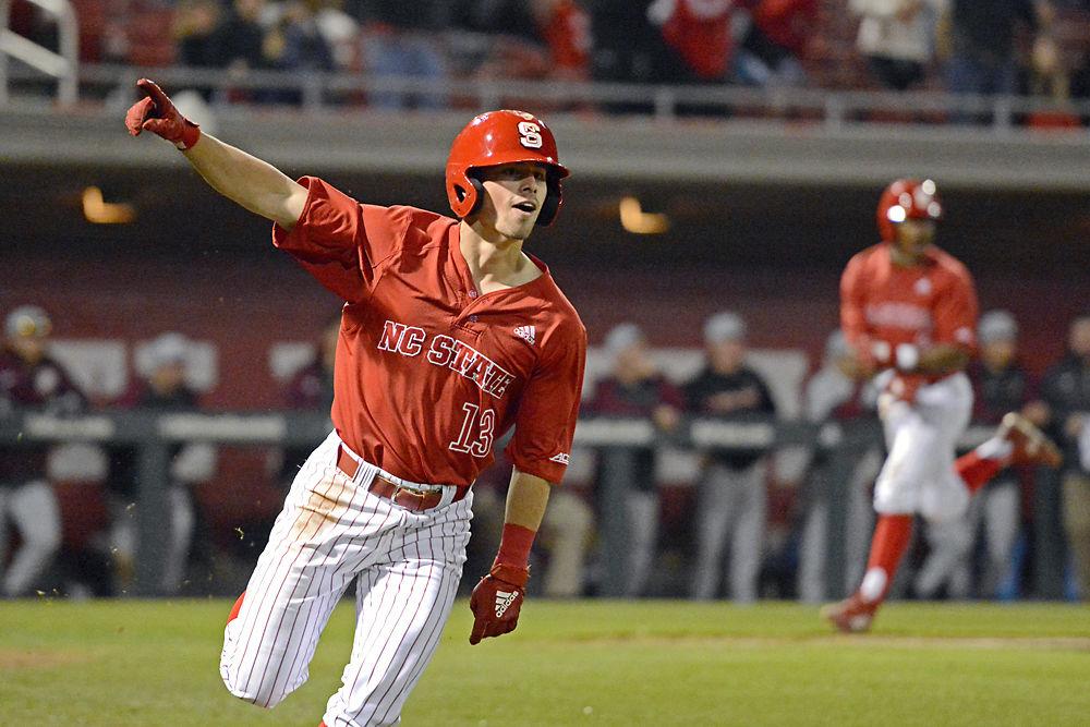Freshman infielder Tyler McDonough celebrates his walk-off base hit against Florida State on Saturday, March 16, 2019 at Doak Field. McDonough went 3-4 with one double, two runs batted in, two runs scored and one walk in the Wolfpack&#8217;s 9-8 win over the Seminoles.