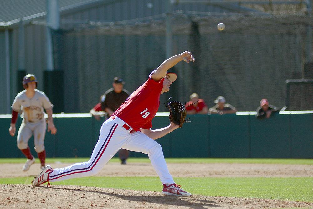 Redshirt sophomore pitcher Dalton Feeney delivers the ball during the first game of the doubleheader against Minnesota on Saturday, March 2, 2019 at Doak Field. The Wolfpack beat the Gophers 3-2, with Feeney pitching 2.1 innings, giving up two hits, zero earned runs, and striking out two.