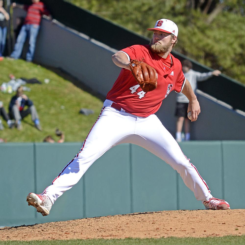 Junior pitcher Kent Klyman delivers the ball on Saturday March 2, 2019 at Doak Field. The Wolfpack beat the Gophers 3-2 during the first game of the doubleheader that day. Klyman pitched 1.1 innings, striking out two and giving up three hits and one earned run.