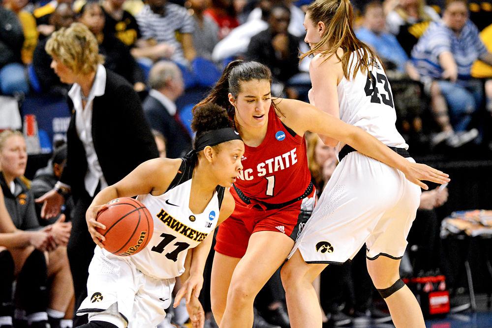 Junior guard Aislinn Konig tries to fight through a screen set by Iowa forward Amanda Ollinger on Saturday, March 30, 2019 at Greensboro Coliseum. Konig recorded 10 points on 4-7 shooting along with five assists. The Wolfpack lost to the Hawkeyes 79-61.