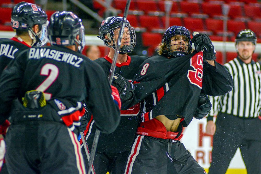 NC State Ice Hockey celebrates after Nikita Anistratov, a sophomore studying applied mathematics, scores at the annual Backyard Brawl on Monday, Oct. 22 in PNC Arena. The Icepack beat UNC-Chapel Hill 9-5.