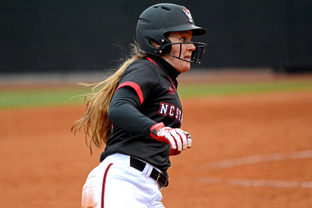 Sophomore infielder Logan Morris rounds third base on her way to home plate against Wisconsin on Sunday, Feb. 17, 2019 at Dail Softball Stadium. Morris went 1-3 with one run batted in and one run scored. The Wolfpack lost to the Badgers 6-3.