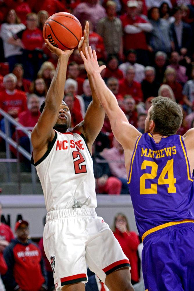 Redshirt senior guard Torin Dorn shoots a fadeaway in Reynolds Coliseum on Wednesday, March 27, 2019. Dorn led the team in scoring with 34 points, shooting 15-22 from the field. The Wolfpack lost 94-93 to Lipscomb.