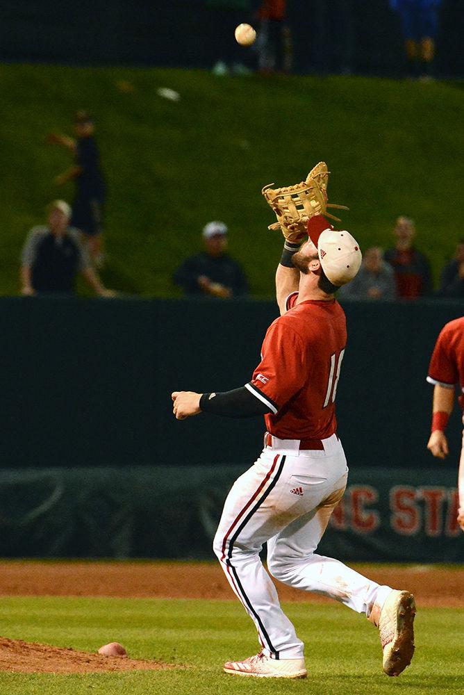 Senior infielder Evan Edward catches the ball during the game against Florida Sate on Friday, March 15 at Doak Field. Edward went 3-1 with two runs, 1 RBI and one strikeout scored in the Wolfpack's 16-0 win.