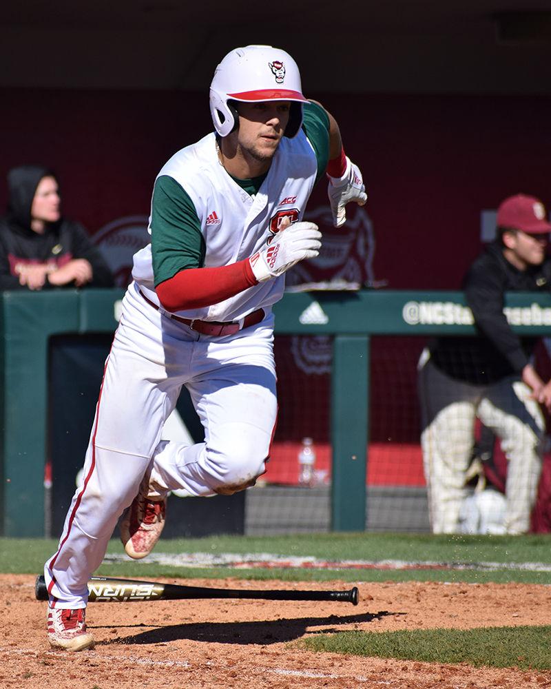 Junior infielder Will Wilson sprints to first base against Florida State on Sunday, March 17, in Doak Field. The Wolfpack lost 5-7 to the Seminoles, with Wilson earning 1 walk and 1 strikeout.