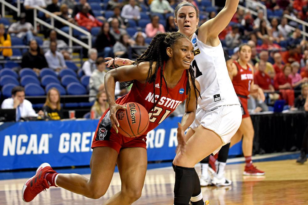 Senior forward DD Rogers attacks the basket against Iowa on Saturday, March 30, 2019 in the Greensboro Coliseum. Rogers shot 5-11 from the field and totaled 12 points in the 79-61 loss to the Hawkeyes.