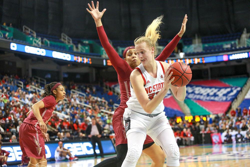 Freshman center Elissa Cunane works in toward the paint. Cunane led the team with 22 points while also putting up nine rebounds. The Pack struggled but were able to outlast the Seminoles 69-62 on Friday, March 8 in Greensboro Coliseum.