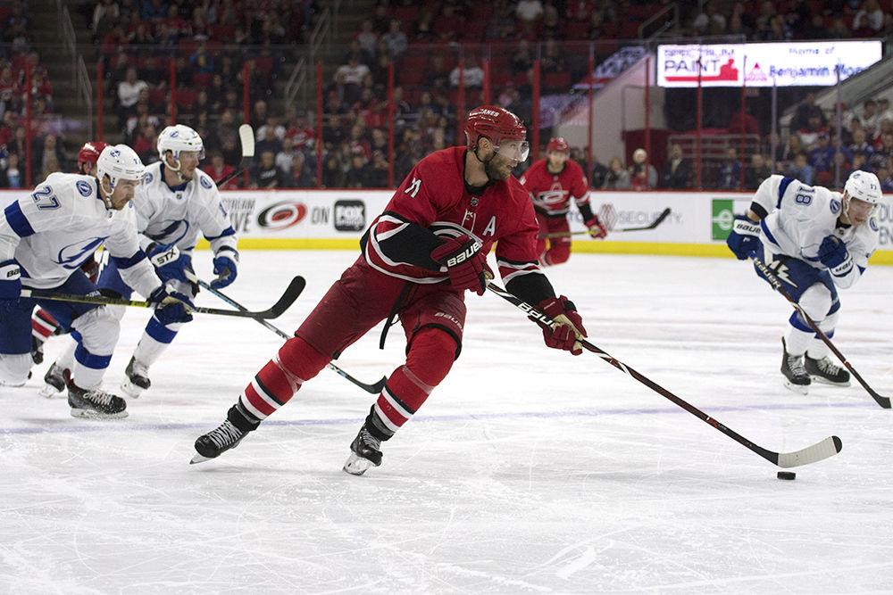Center Jordan Staal dribbles the puck into Tampa Bay Lightning territory at PNC Arena, Thursday, March 21. Staal scored once and had one assist across 22 shifts. Despite leading 3-2 going into the third period, the Canes lost to the Lightning, 3-6.&#160;