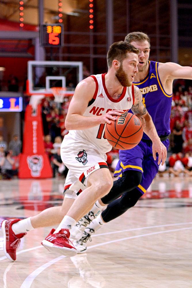 Sohpomore guard Braxton Beverly drives into the lane in Reynolds Coliseum on Wednesday, March 27, 2019. Beverly scored 6 points and had 3 assists. The Wolfpack lost 94-93 to Lipscomb, causing them to get knocked out of the NIT and end their season.
