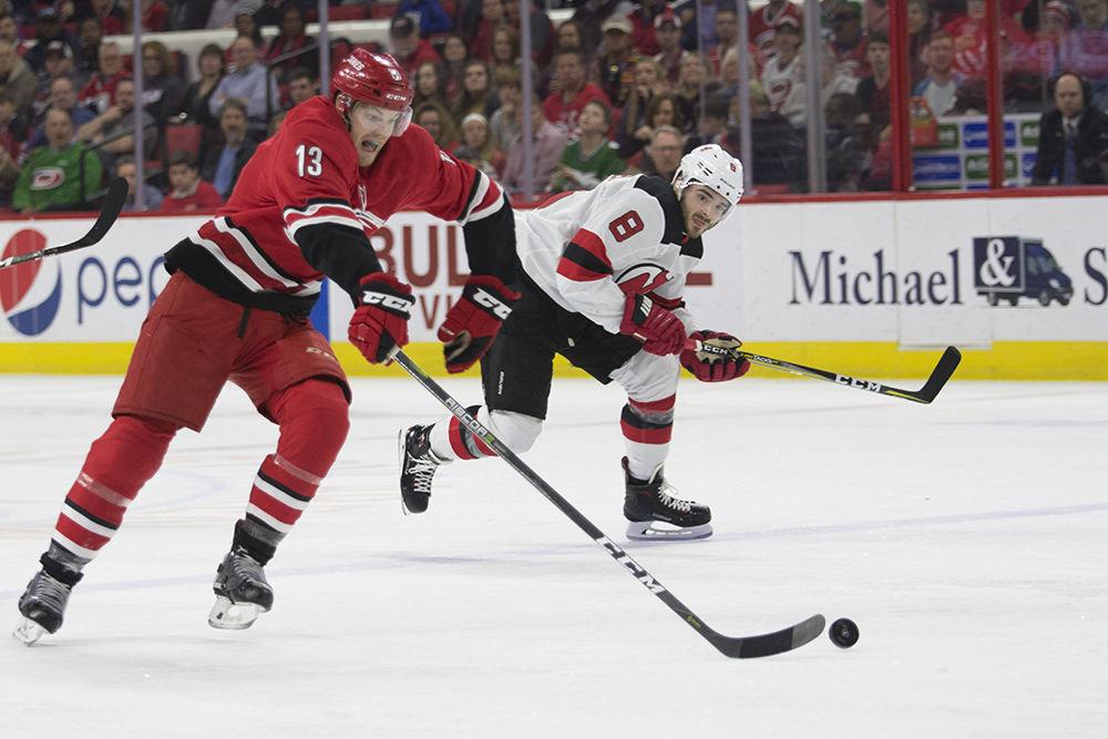 Left wing Warren Foegele takes control of the puck to score halfway through the first period in the last home game of the regular season, Thursday, April 4. Foegele tied up the game, aiding in a playoff-clinching 3-1 victory over the New Jersey Devils.