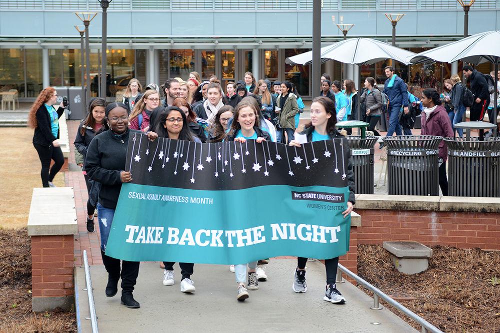 Students at the Take Back the Night March outside Talley Student Union to bring awareness to sexual assault and dating violence on campus on Tuesday, April 2. Take Back the Night is an annual event that is a part of Sexual Assault Awareness Month.