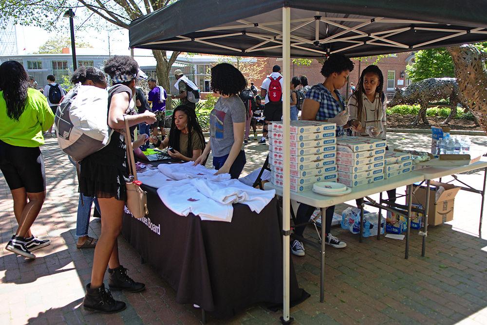Students gather at Wolf Plaza for Pack the Plaza on Wednesday, April 10. Pack the Plaza gave out free pizza, t-shirts, and other knick knacks.
