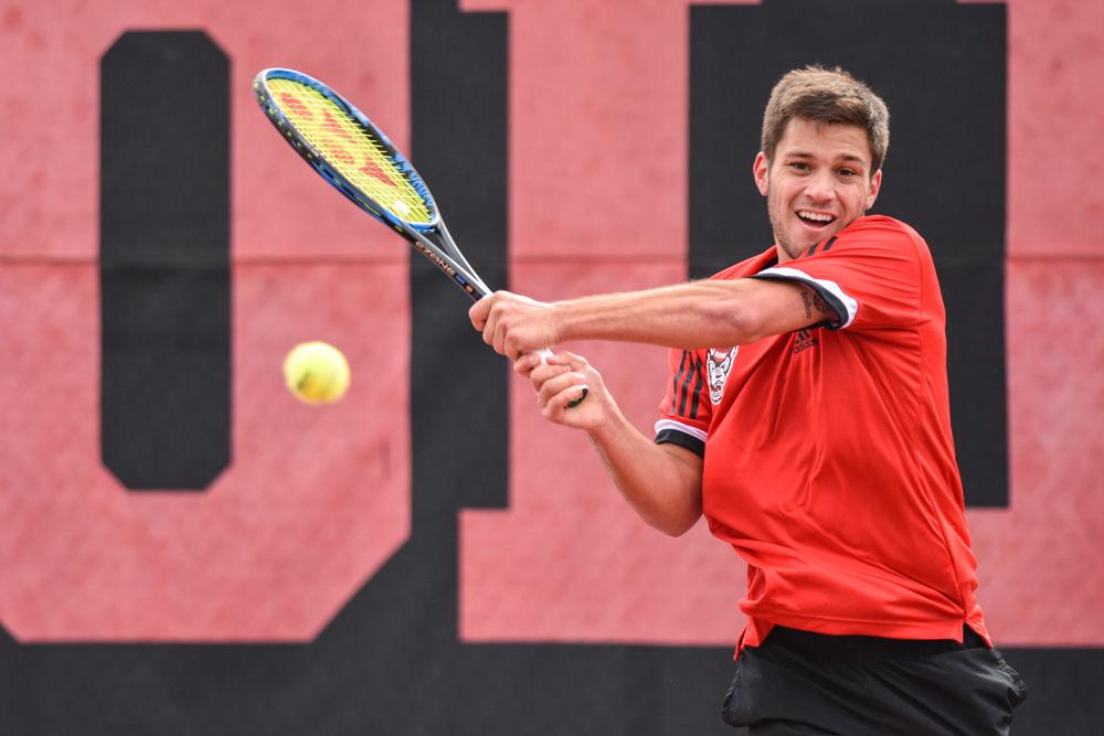 Junior Alexis Galarneau returns a ball during a singles match against South Carolina at the J.W. Isenhour Tennis Center on Saturday, Feb. 9, 2019. The Wolfpack lost 6-1 to the Gamecocks and won 7-0 against the North Carolina A&amp;T Aggies later that day.