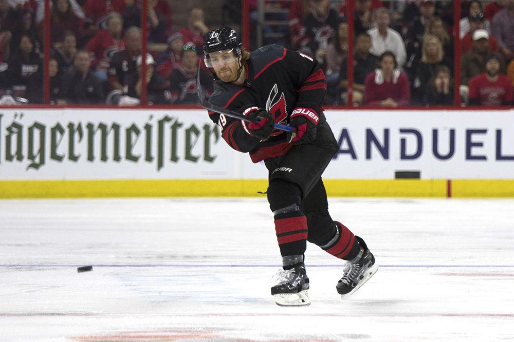 Defenseman Dougie Hamilton shoots the puck into Washington Capitals territory in PNC Arena, Monday, April 15. The Canes shut out the defending champs during game 3 of the series, 5-0.&#160;