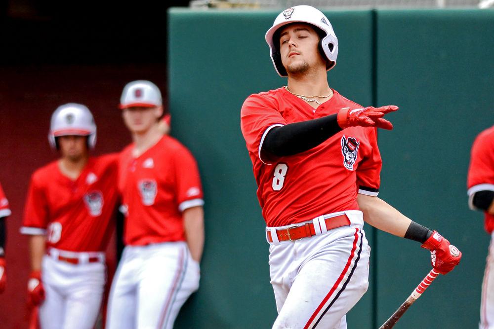 *Editor's note: the original photo has been replaced.
Junior infielder Will Wilson swings and misses against Louisville on Saturday, April 13, 2019 at Doak Field. Wilson went 2-4 with two home runs, one walk and one strikeout in the Wolfpack&#8217;s 14-10 loss to the Cardinals.