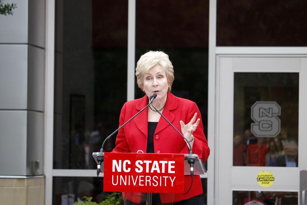 Director of Athletics Debbie Yow remarks on Irwin Holmes' class of '60 remarkable athletic accomplishments at the renaming ceremony of Holmes Hall outside Holmes Hall, formerly known as University College Commons, on Thursday, Nov. 1, 2018. Irwin Holmes was the first African-American undergraduate at NC State.