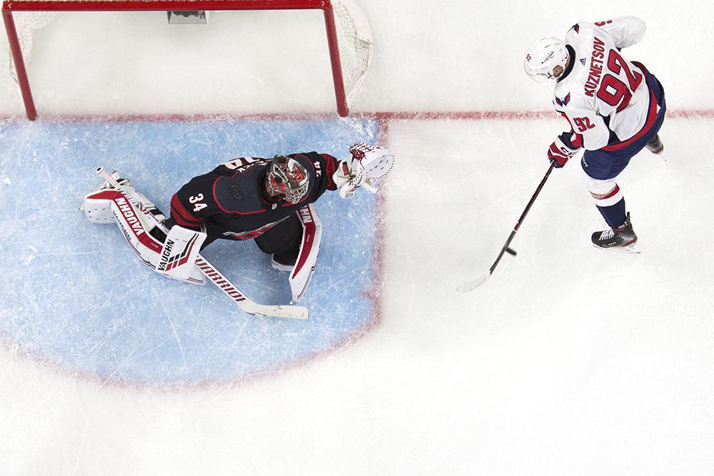 Carolina Hurricanes goalie Petr Mrazek blocks Washington Capitals forward Evgeny Kuznetsov's shot on goal during the third game of the first round of the Stanley Cup Playoffs in PNC Arena, Monday, April 15. The Canes ended a nine year playoff drought, the longest in NHL history. The Hurricanes blew back the Capitals in a shut out, 5-0.&#160;