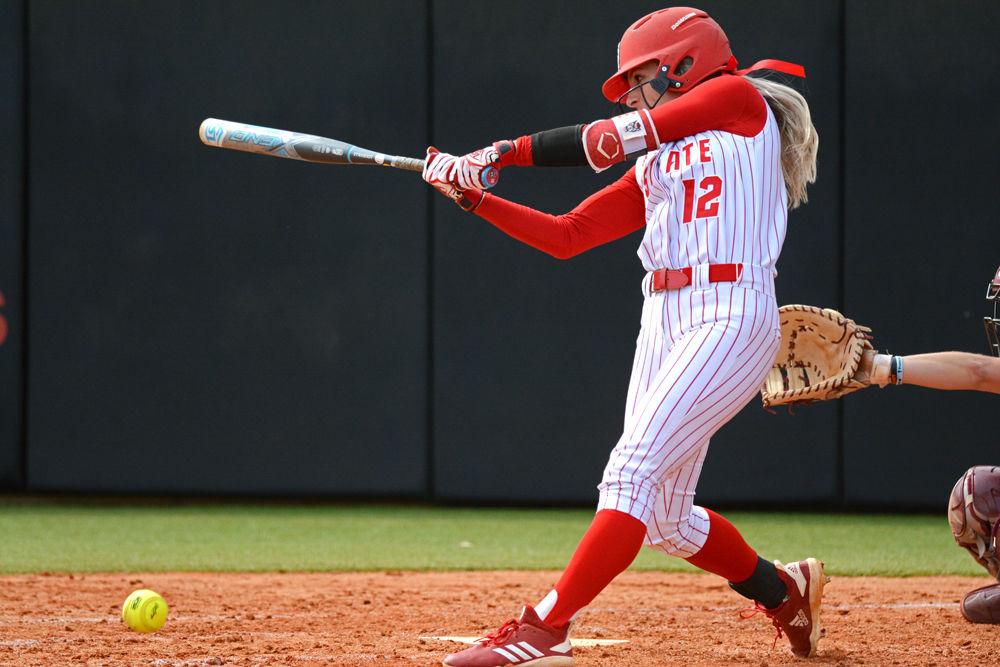 Senior infielder Natalie Jones hits the ball against Virginia Tech on Saturday, March 16, 2019 at Dail Softball Stadium. Jones went 0-2 with one strikeout and one error in the Wolfpack&#8217;s 12-1 loss.