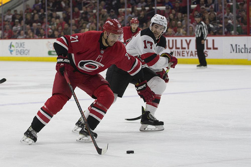 Right wing Nino Niederreiter dribbles the puck in New Jersey Devils territory prior to scoring the game winning goal, helping the Canes clinch a spot in the playoff, Thursday, April 4 in PNC Arena. The Canes beat the Devils, 3-1 in regulation.&#160;