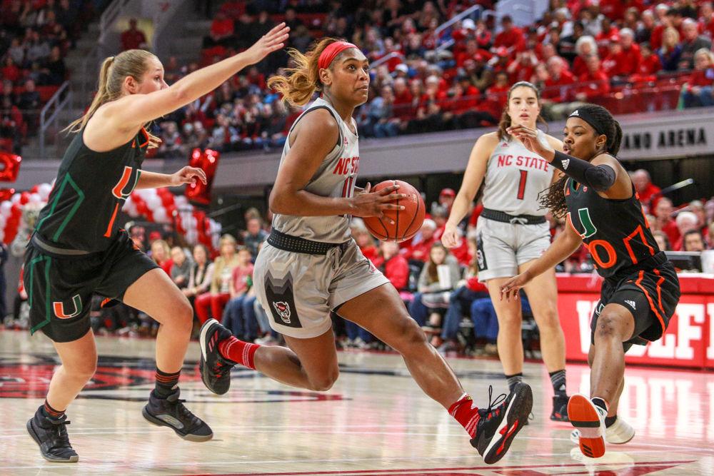 Graduate guard Kiara Leslie drives in to the paint for a basket against Miami. Leslie, one of three Wolfpack players honored on senior night, put up 12 points, six rebounds and two blocks. The Wolfpack started sluggish but were able to hold off the No. 15 Hurricanes 70-68 in Reynolds Coliseum on Sunday, March 3.