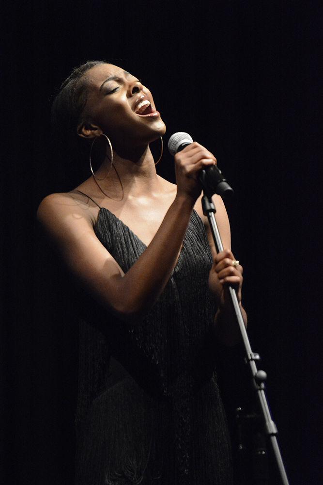 Maayan Eaves, a second-year student studying communication and arts studies, sings during the talent portion of the 2019 Annual Pan-Afrikan Pageant. The pageant, a part of Pan-Afrikan Week, took place on Wednesday, April 10 in Talley Ballroom. At the close of the event, Eaves was crowned queen.