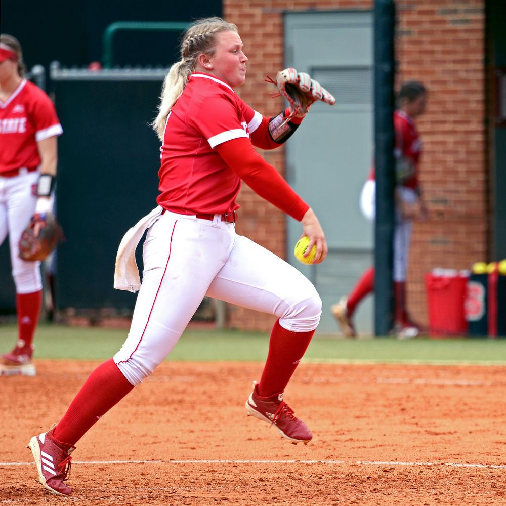 Freshman pitcher Sydney Nester pitches the ball during the game against Syracuse on Saturday, April 7, 2019 at Dail Softball Stadium. The Wolfpack lost 5-3.