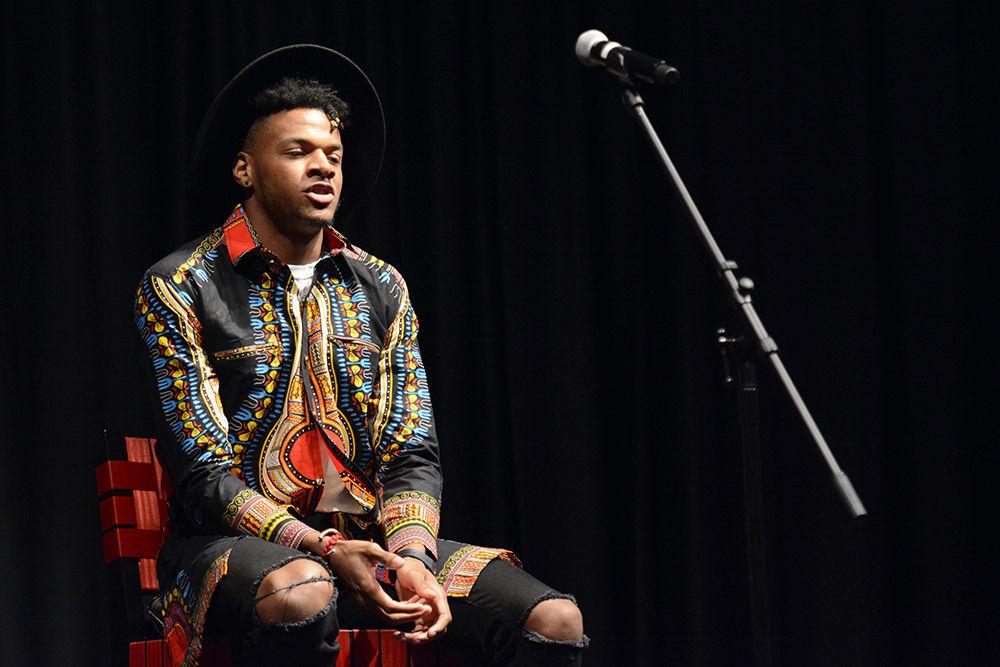 Jordan Bullock, a third-year studying animal science, performs a spoken word poem about culture during the 2019 Annual Pan-Afrikan Pageant on Wednesday, April 10, in Talley Ballroom. The pageant featured six contestants competing to be king and queen. Bullock was crowned king and Maayan Eaves, a second-year studying communication and arts studies, was crowned queen.
