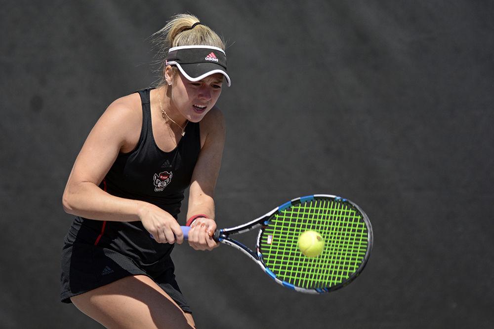 Senior Amanda Rebol returns a volley against Virginia Tech junior Shene Disbergen on March 24, at J.W. Isenhour Tennis Center. Rebol defeated Disbergen 6-0, 6-3 during the Wolfpack&#8217;s 5-2 overall win.