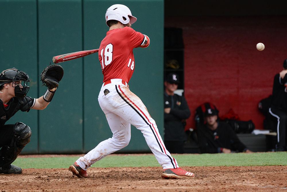 Senior infielder Evan Edwards takes a pitch against Louisville on April 13 at Doak Field. Edwards went 2-3 with one triple, one double and two runs scored in the Wolfpack&#8217;s 14-10 loss to the Cardinals.