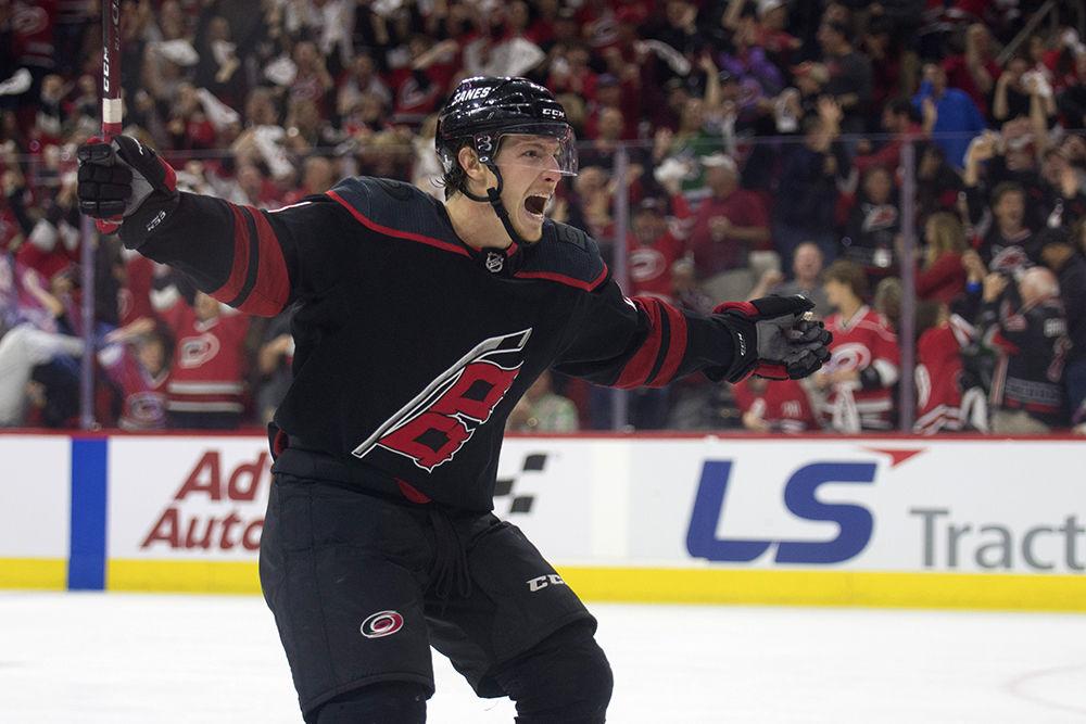Left winger Brock McGinn celebrates an assist during game six of the first round of Stanley Cup playoffs, Monday, April 22, in PNC Arena. McGinn had one assist on one point during 25 shifts, helping the Canes tie up the series for a 5-2 win before going back to Washington D.C. for the last game of the series.&#160;